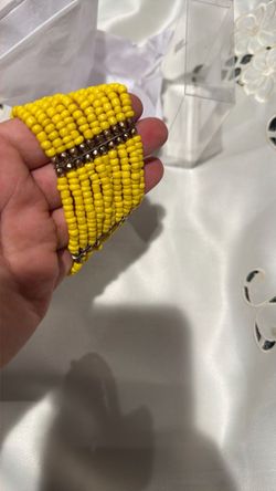 glass bead roll stretch bracelet, featuring a chunky multi-strand design with A Gold Tone Beaded On Metal Silver Spring Flex, $10