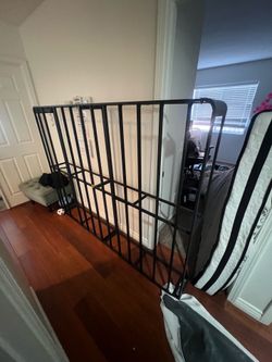 Metal queen bed frame that comes apart and stained queen mattress must take both