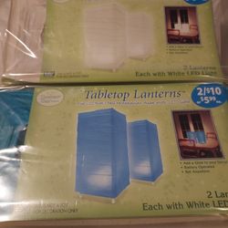 9 X 5 Inch Table Lanterns, Rectangle. 2032 Button Batteries. 2 White  2 Turquoise.  New In Box, Never Used. Both For $10. MUST P/U IN MARYSVILLE 