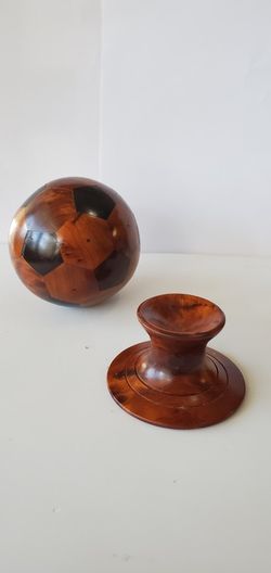 Thuya wood soccer balls and stands.