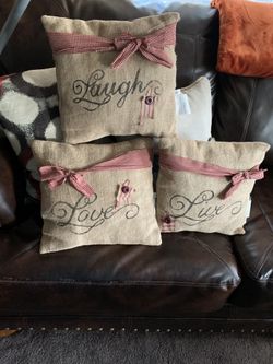 3 throw pillows