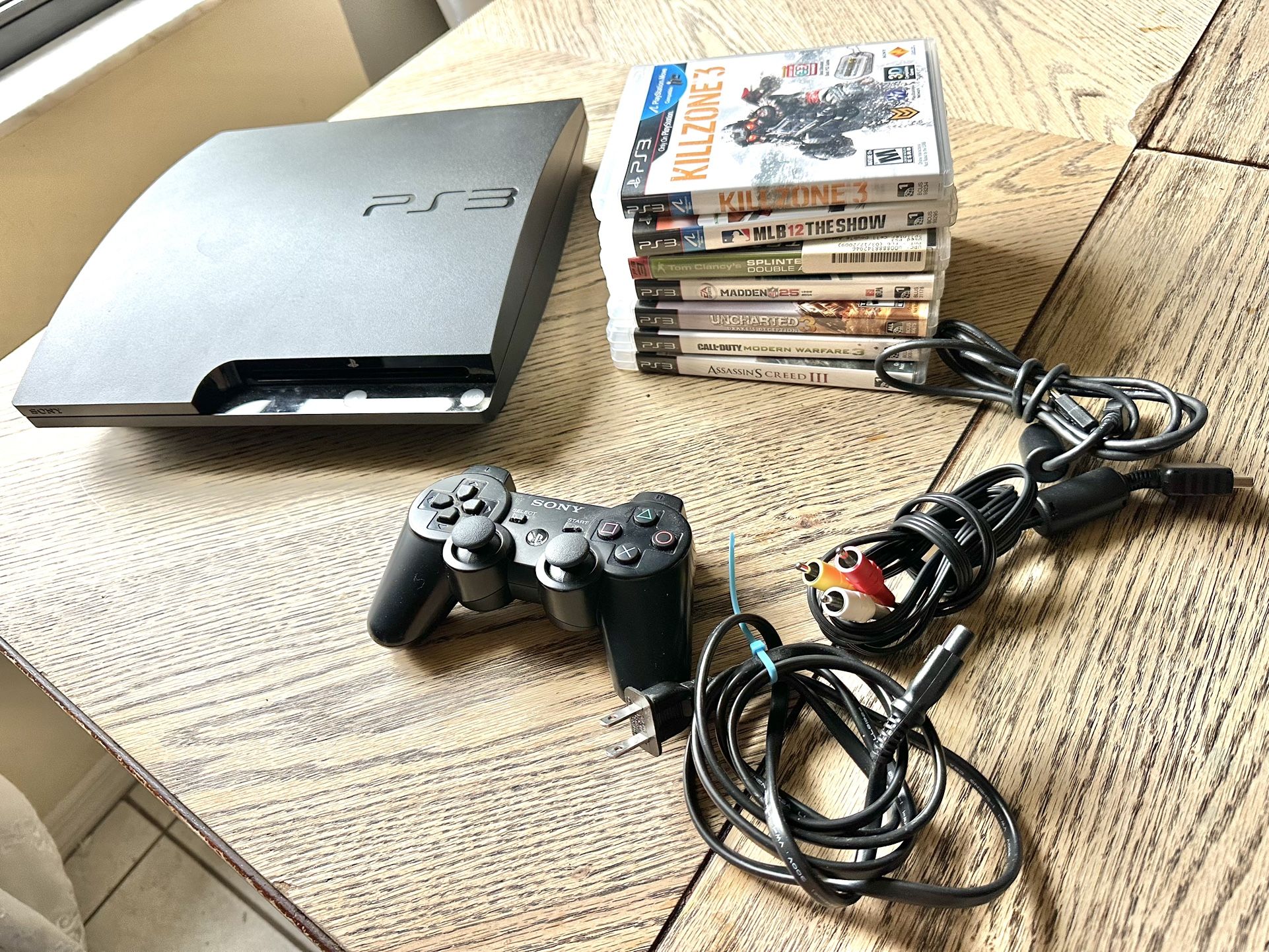 PlayStation 3 With Games An Controllers