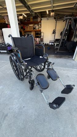Wheelchair with removable leg rests