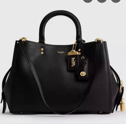 Brand new coach rouge 31 still in box