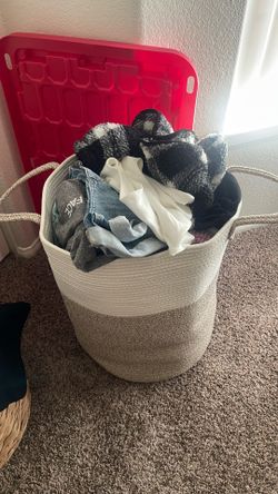Big basket full of women’s clothes