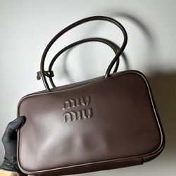 Miu Miu Embossed Logo Leather Bowling Bag
