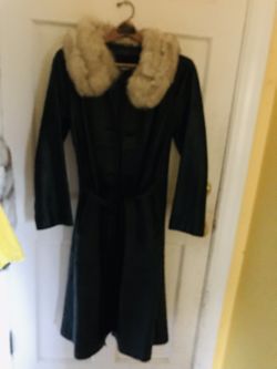 Leather coat with real fur collar