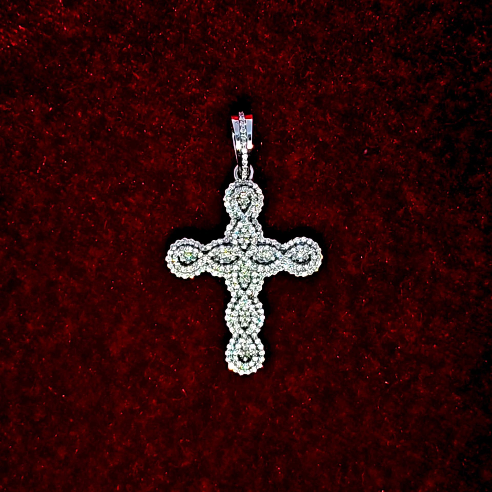 Elegant Diamond Cross in 10K White Gold and Studded in 0.68 CTW of Diamonds