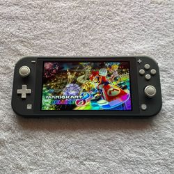 NINTENDO SWITCH LITE MOD + 125 SWITCH GAMES MARIO KART,MARIO PARTY,POKEMON,ZELDA and More