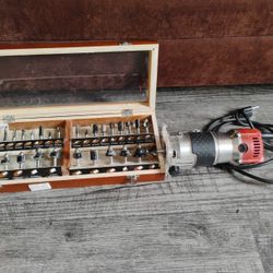 Router With 30 Piece Bit Set
