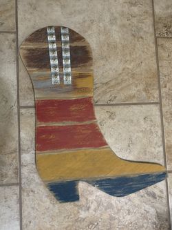 Wood boot with metal accent