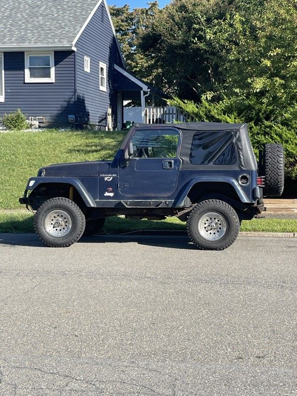 Tj