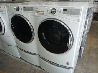 Whirlpool front load washer and dryer set on pedestals - Free delivery