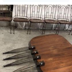 Heavy metal and special wood table and six chairs