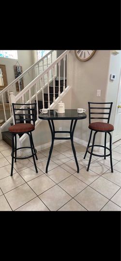 Two chairs one table outside doors, excellent condition
