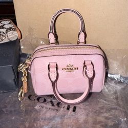 Coach little purse pink