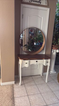 White and brown stain and wall mirror