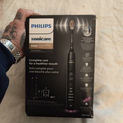 Title: Philips Sonicare 9500 Electric Toothbrush Set (New, No Brush Heads