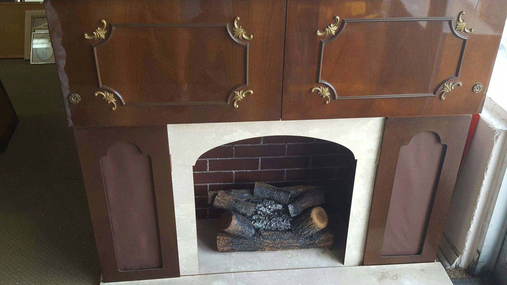 Vintage mid-century fireplace with bar and storage