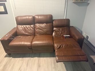 2 Leather Sofas recliners