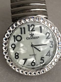 Big large face ladies silver tone stretch watch. Good condition need new battery