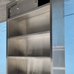 Large stainless steel shelf with cabinet
