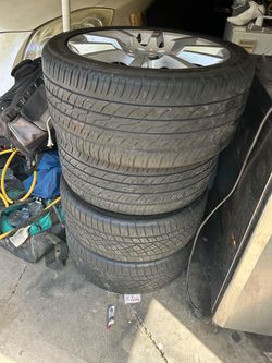 Set of 4 Tires with Silver Alloy Wheels