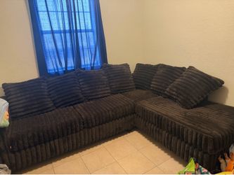 Brown L shape couch