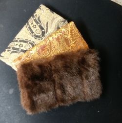 Various fur wallets and purses