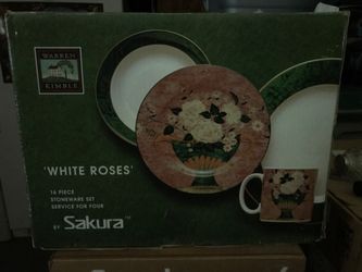 Sakura Stoneware 16 piece service for 4. Never been used. $25