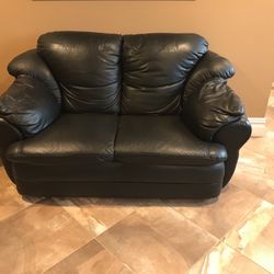 Black leather loveseat great condition