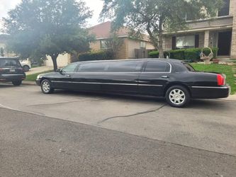 10 Passenger Black Limousine $100An Hr