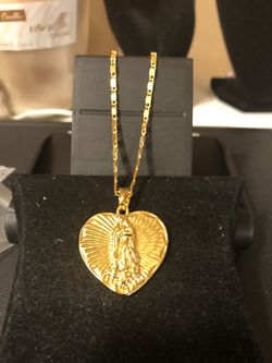 Women’s 14 kt gold plated heart shaped Virgin Mary necklace 22” no refunds