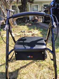 NOVA 4-Wheel Rolling Walker with Padded Seat & Storage Bag – Black (Great Condition)