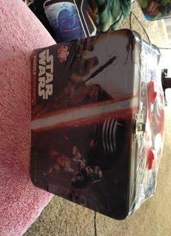 Brand new Star Wars tin lunch or toy pail with a 100 piece puzzle