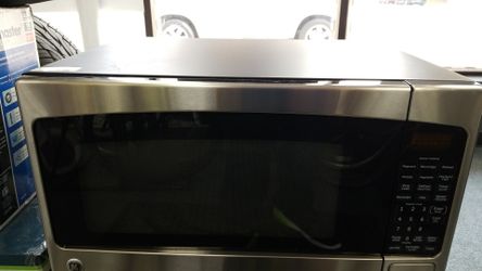 GE microwave 23x18x14