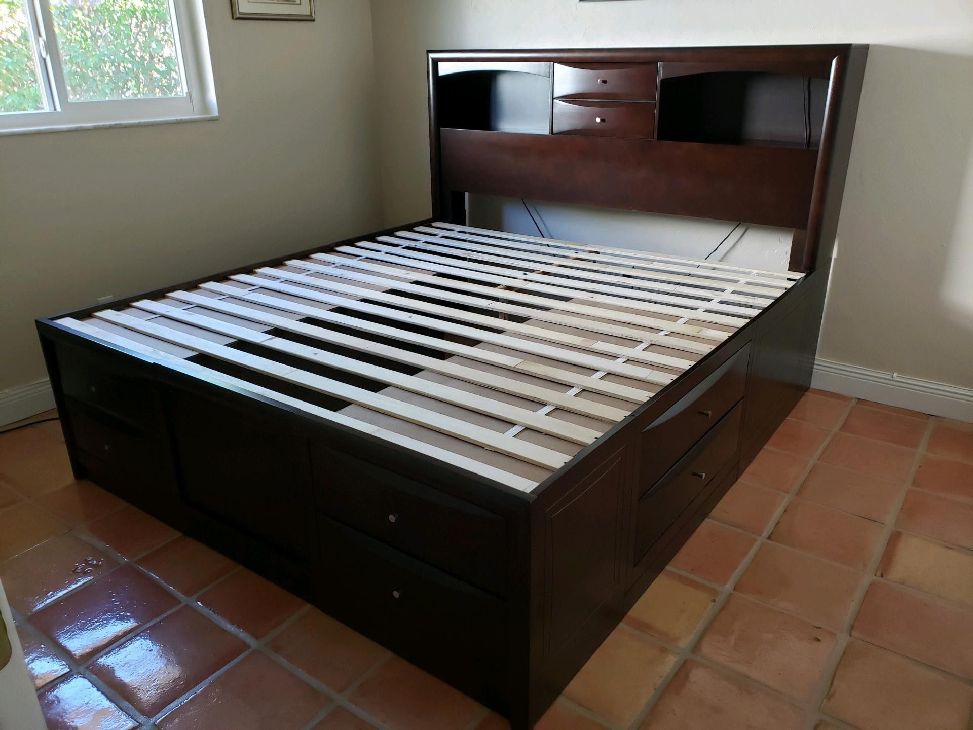 King size bed frame. No damage, no scratches. Lights in cubby hole. Want 500 or best offer