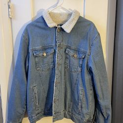 sherpa-lined denim trucker jacket in a medium wash 