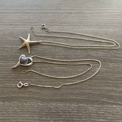 Two Sterling Silver .925 necklaces with pendants made in Italy. Both included
