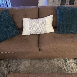 3 Piece Brown Sofa And Love Seat With  Foot Stool Gold Trim And Decorative Pillows