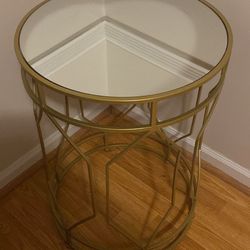 Round mirrored accent table