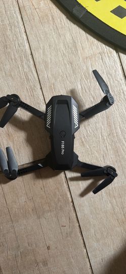 F1 85 pro RC drone with remote and landing pad