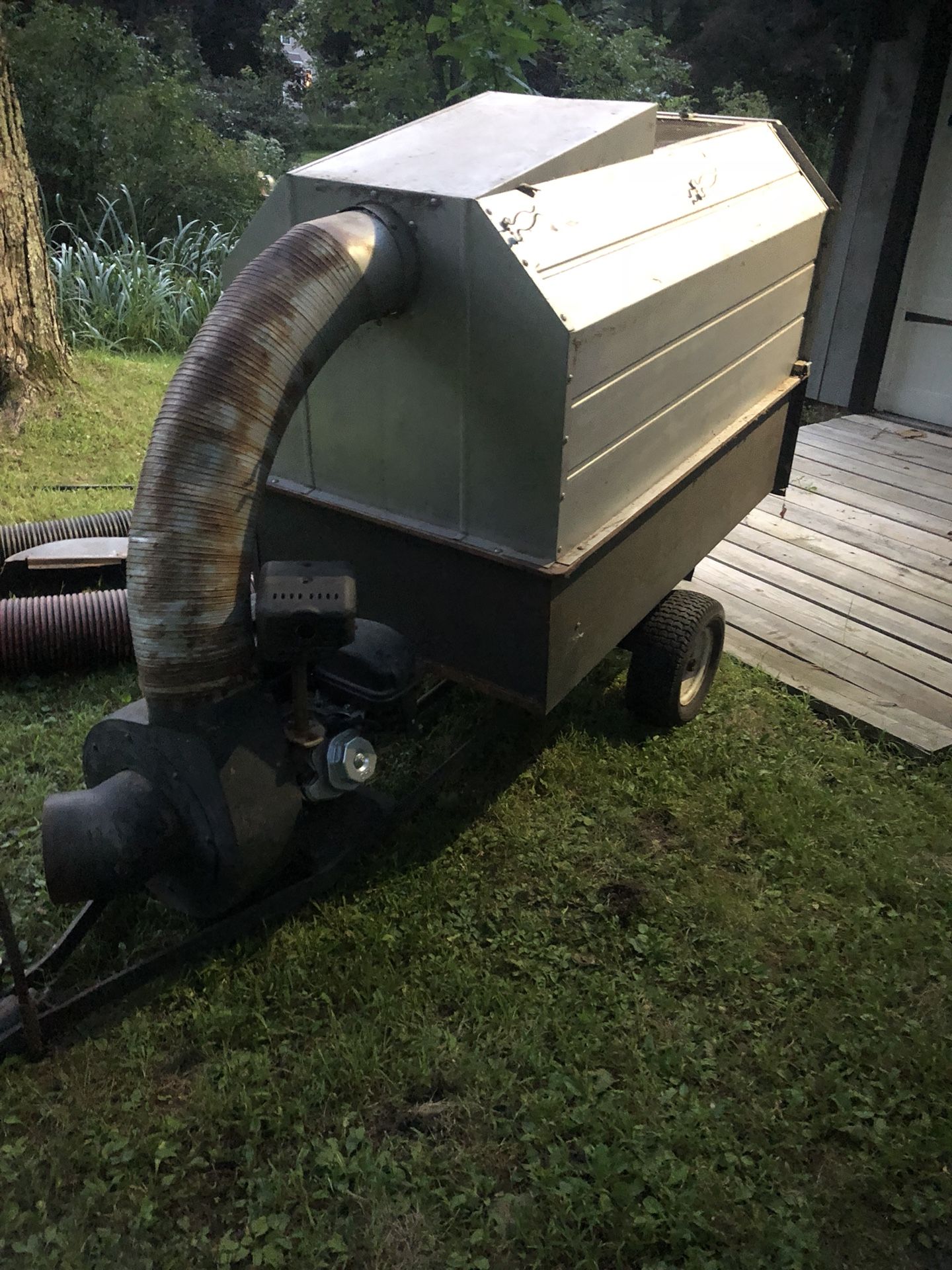 Trac vac leaf vacuum. Engine is new. 8 inch hose.