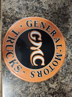 GMC Embossed Round Sign