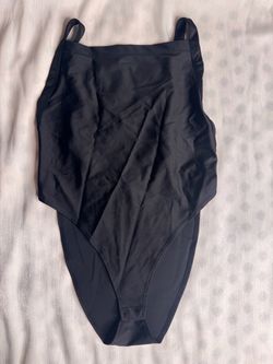 Size S Black One-Piece bodysuit