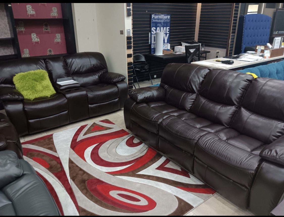 Going out of business sale. Madrid brown leather reclining sofa and loveseat set now $1099. Easy finance option. Same day delivery.