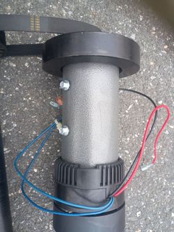Electric rollers with belt tensioners