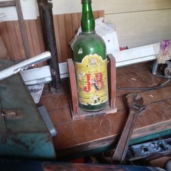 Old Jb Whiskey Bottle On Wood