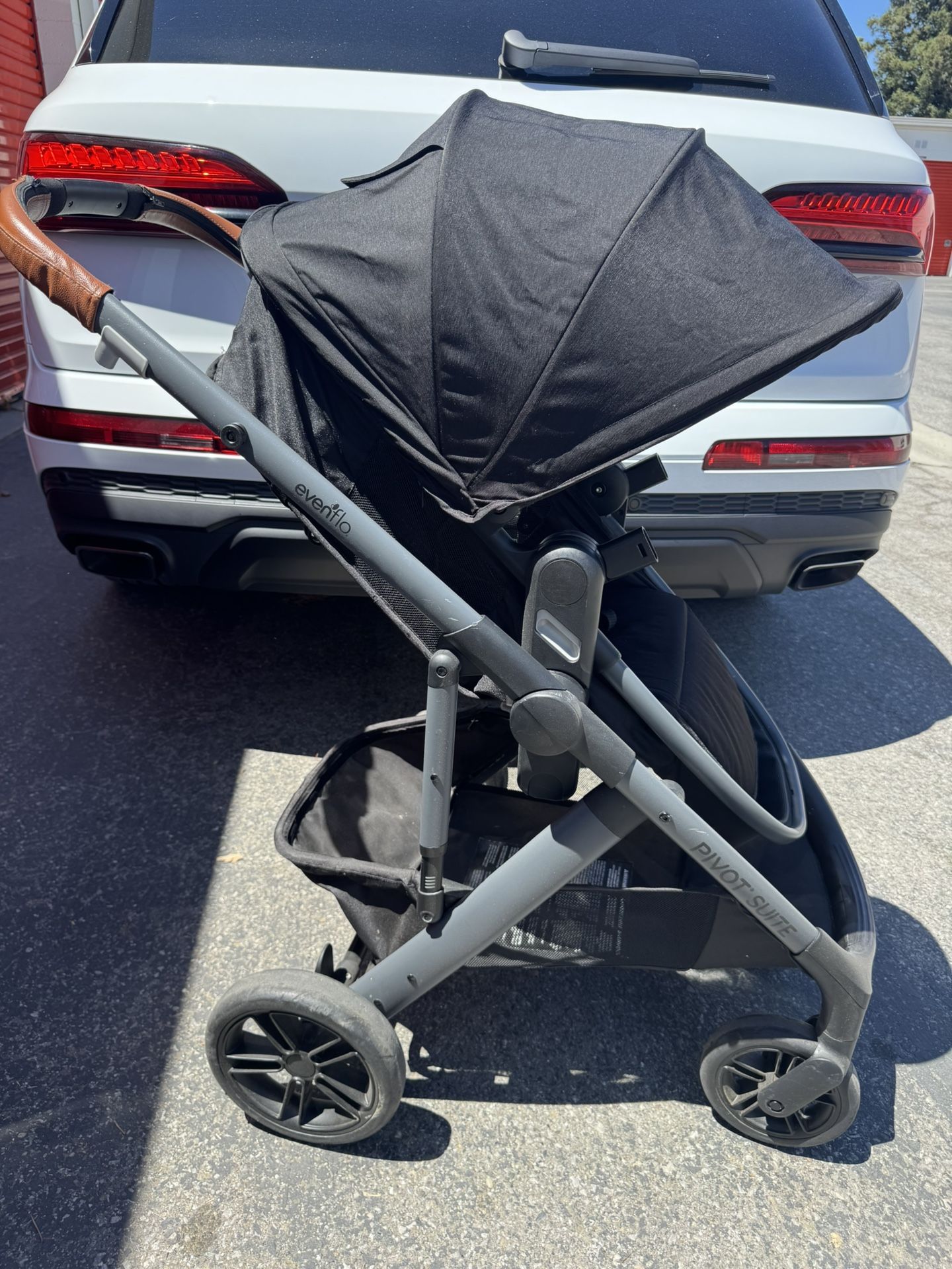 Evenflo Pivot Suite stroller in black. Stroller only.