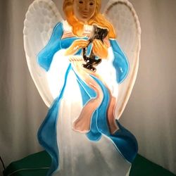 Santa's Best Angel, Includes Light Cord, Measures 40" in the Height, Retired, Hard to Find, Great Details, Colors White and Blue, Excellent Condition.